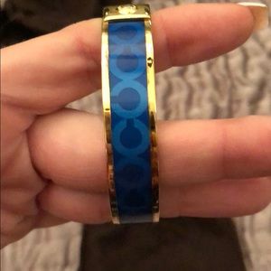 Gold and blue coach bracelet